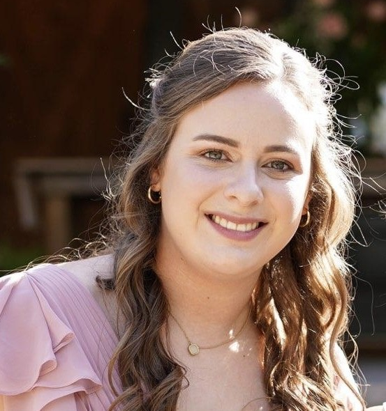 Lauren Pugh, Planning Director at the Commonwealth Regional Council, smiling outdoors in a formal headshot.