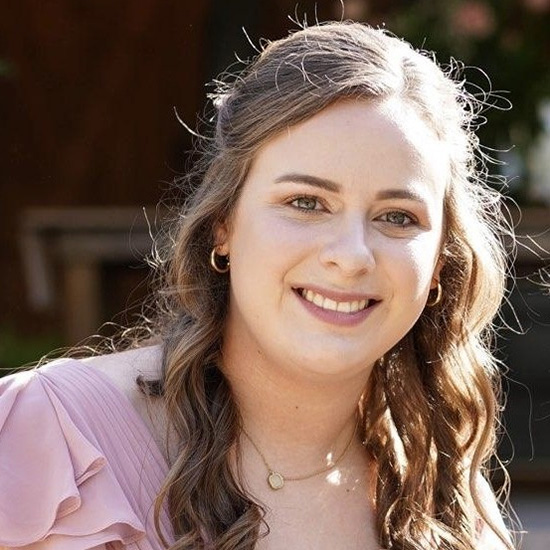 Lauren Pugh, Planning Director at the Commonwealth Regional Council, smiling outdoors in a formal headshot.